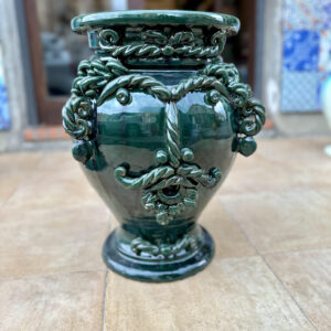 Green vase heads